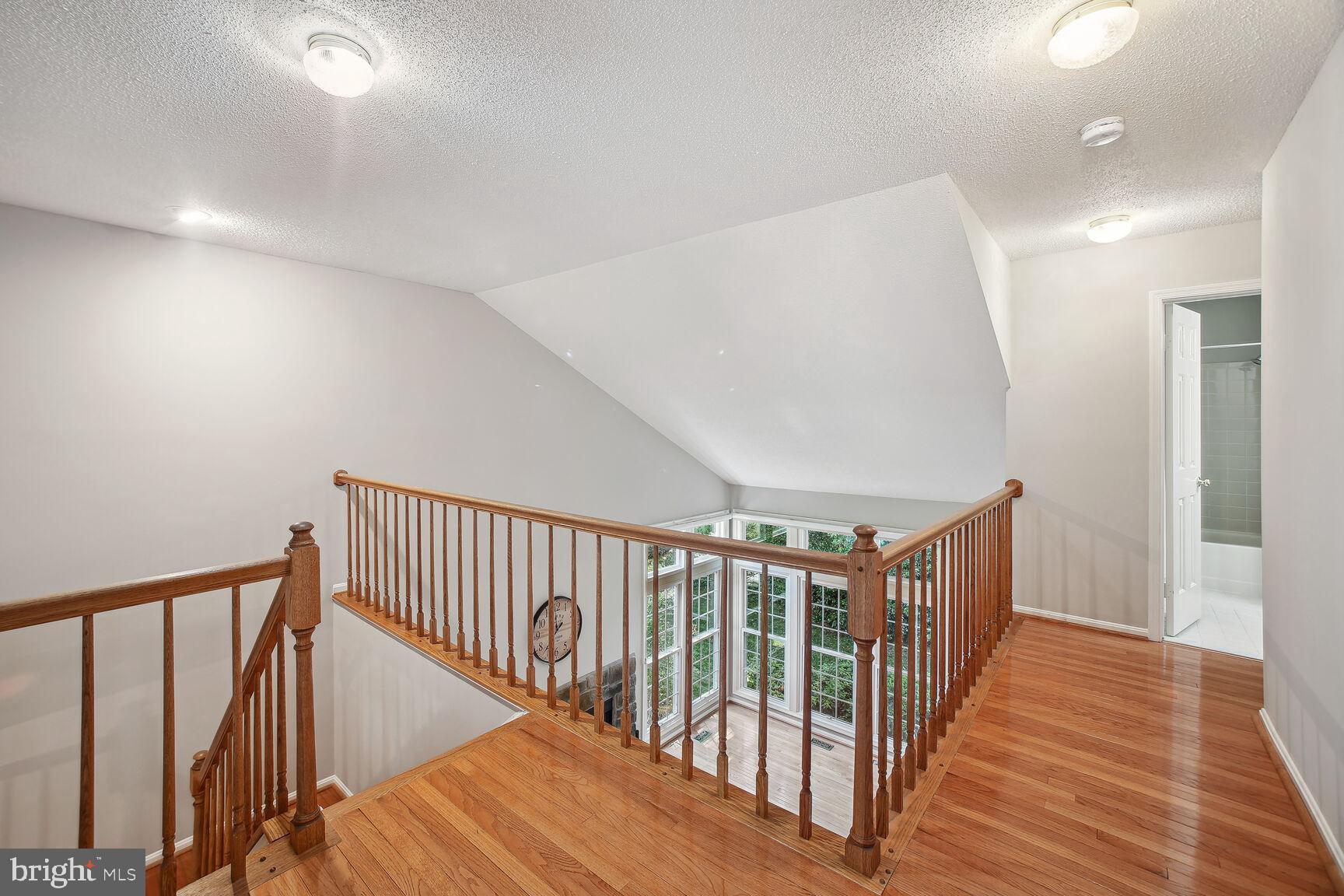 725 Sonata Way Silver Spring, MD 20901 - Photo 13 of 30 Romeo & Juliet staircase overlooks family room