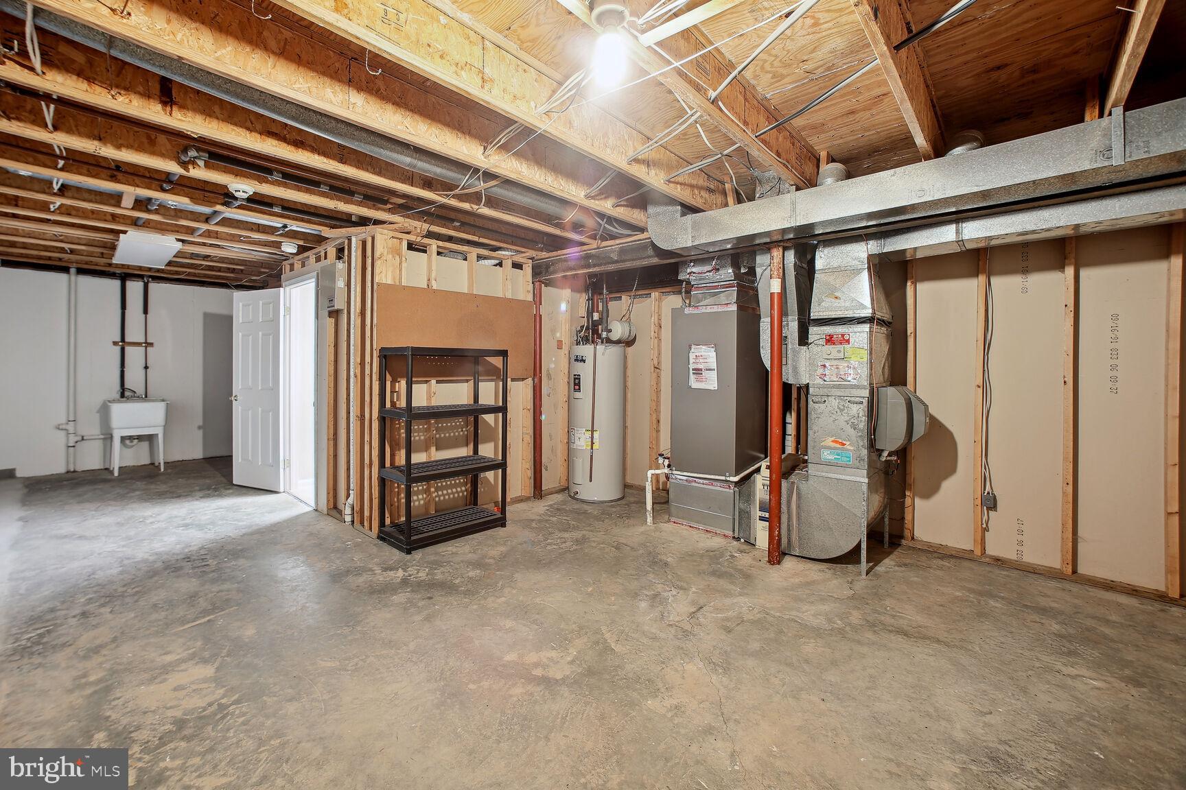 725 Sonata Way Silver Spring, MD 20901 - Photo 27 of 30 Large unfinished area with plenty of storage space