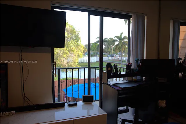 a view of a balcony with chairs