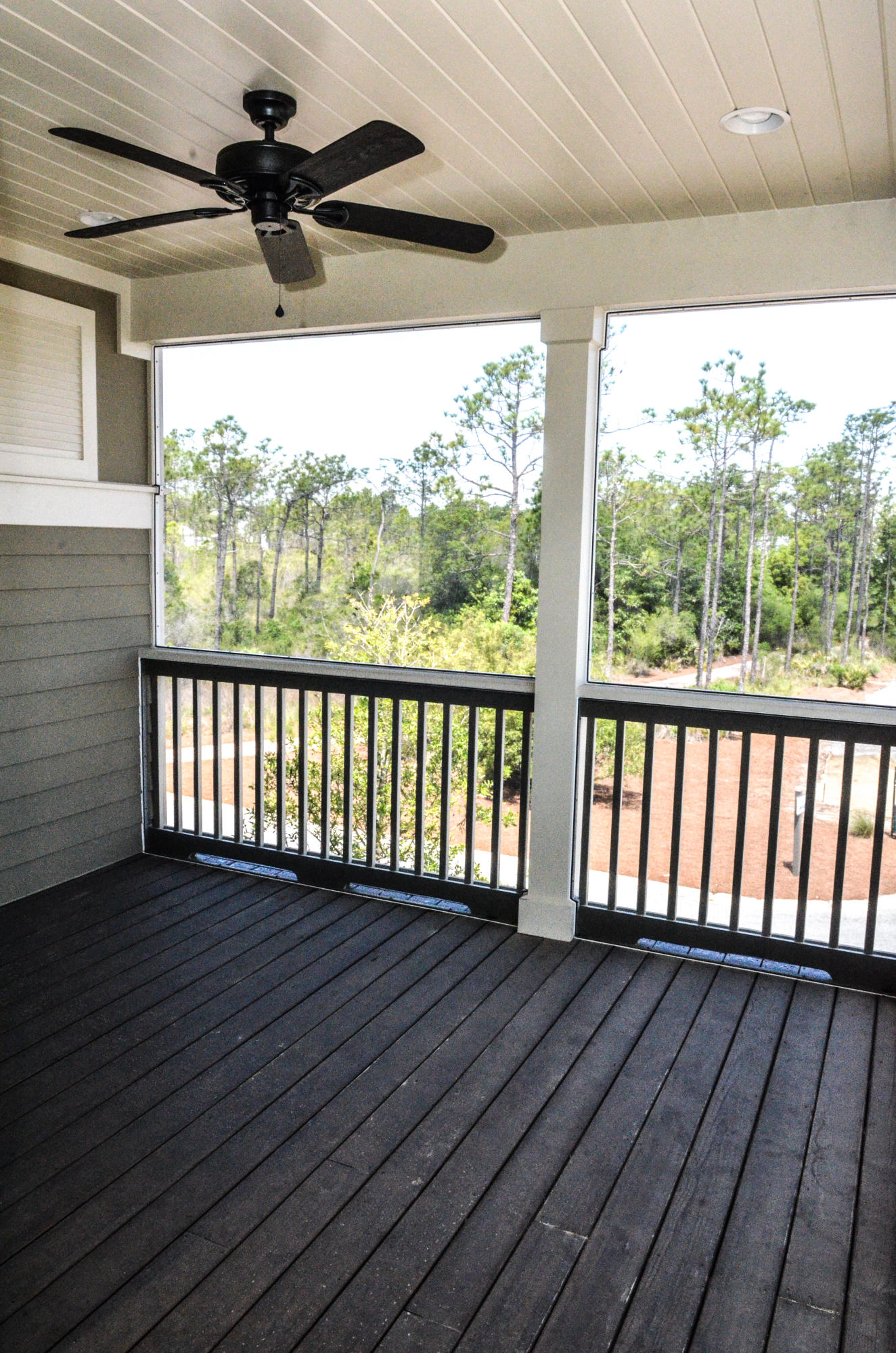 27 Rain Lily Lane Santa Rosa Beach, FL 32459 - Photo 13 of 21 a view of a balcony with wooden floor