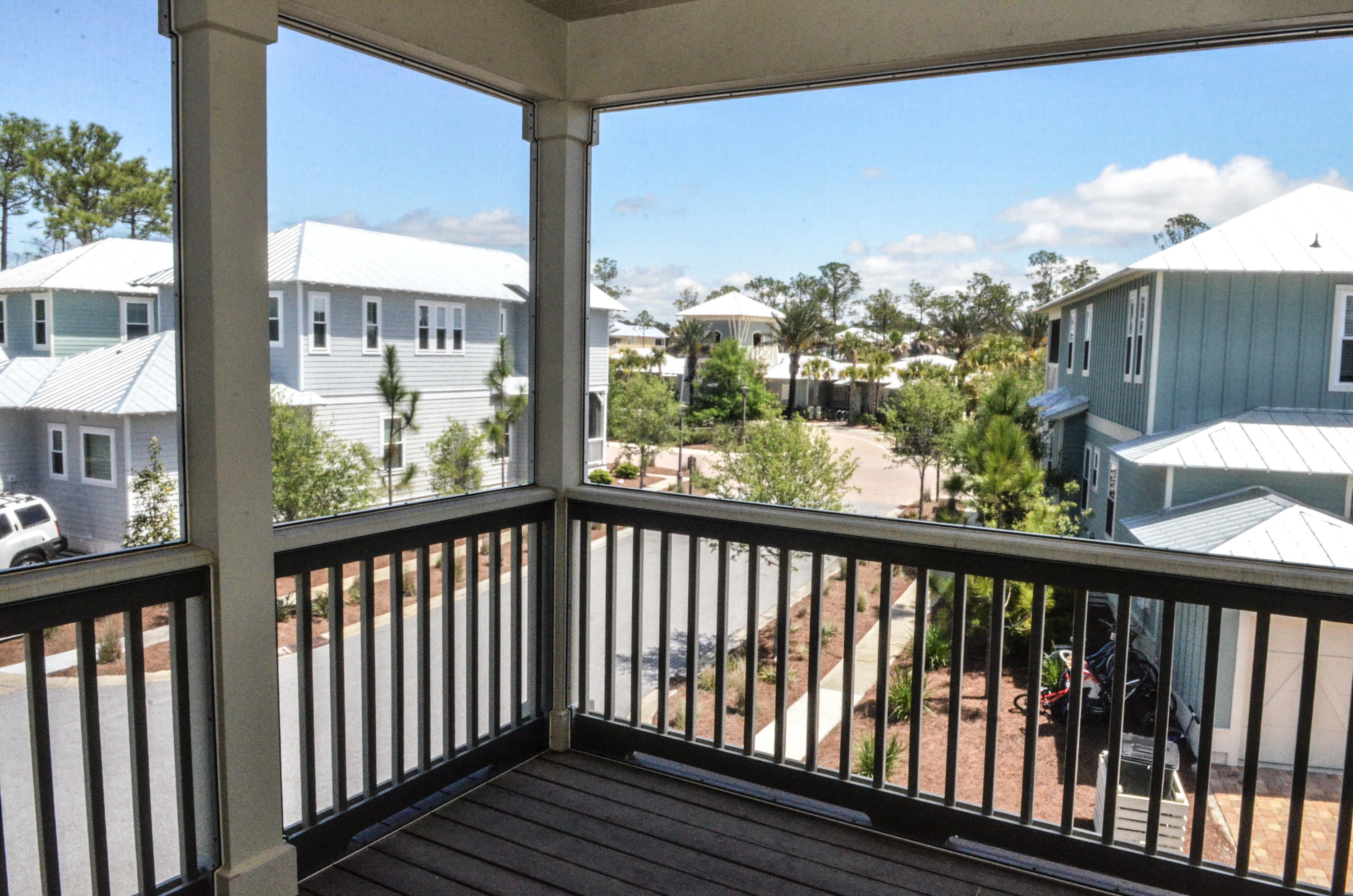 27 Rain Lily Lane Santa Rosa Beach, FL 32459 - Photo 14 of 21 a view of a balcony with wooden floor