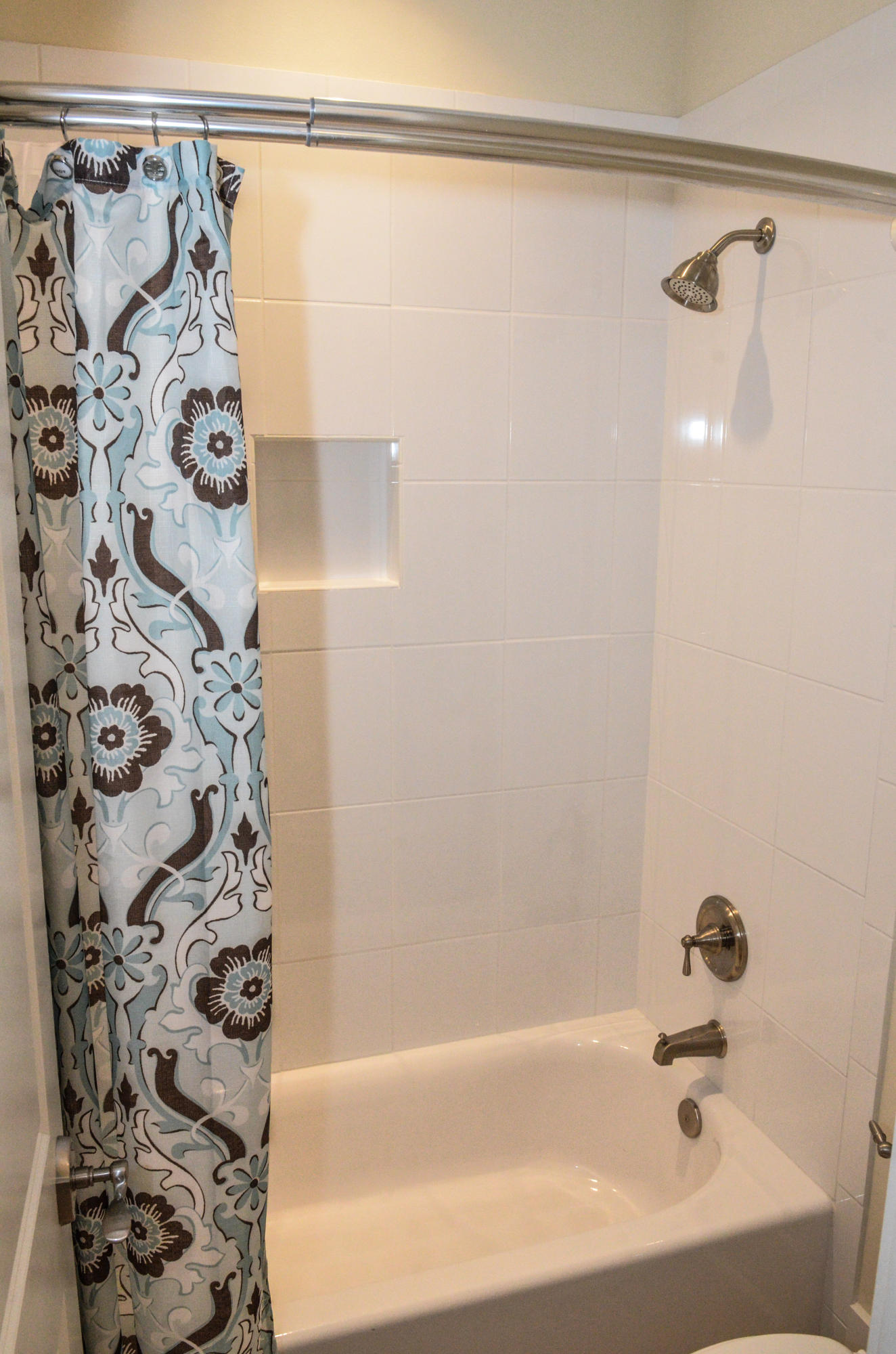 27 Rain Lily Lane Santa Rosa Beach, FL 32459 - Photo 18 of 21 a bathroom with a bathtub and shower