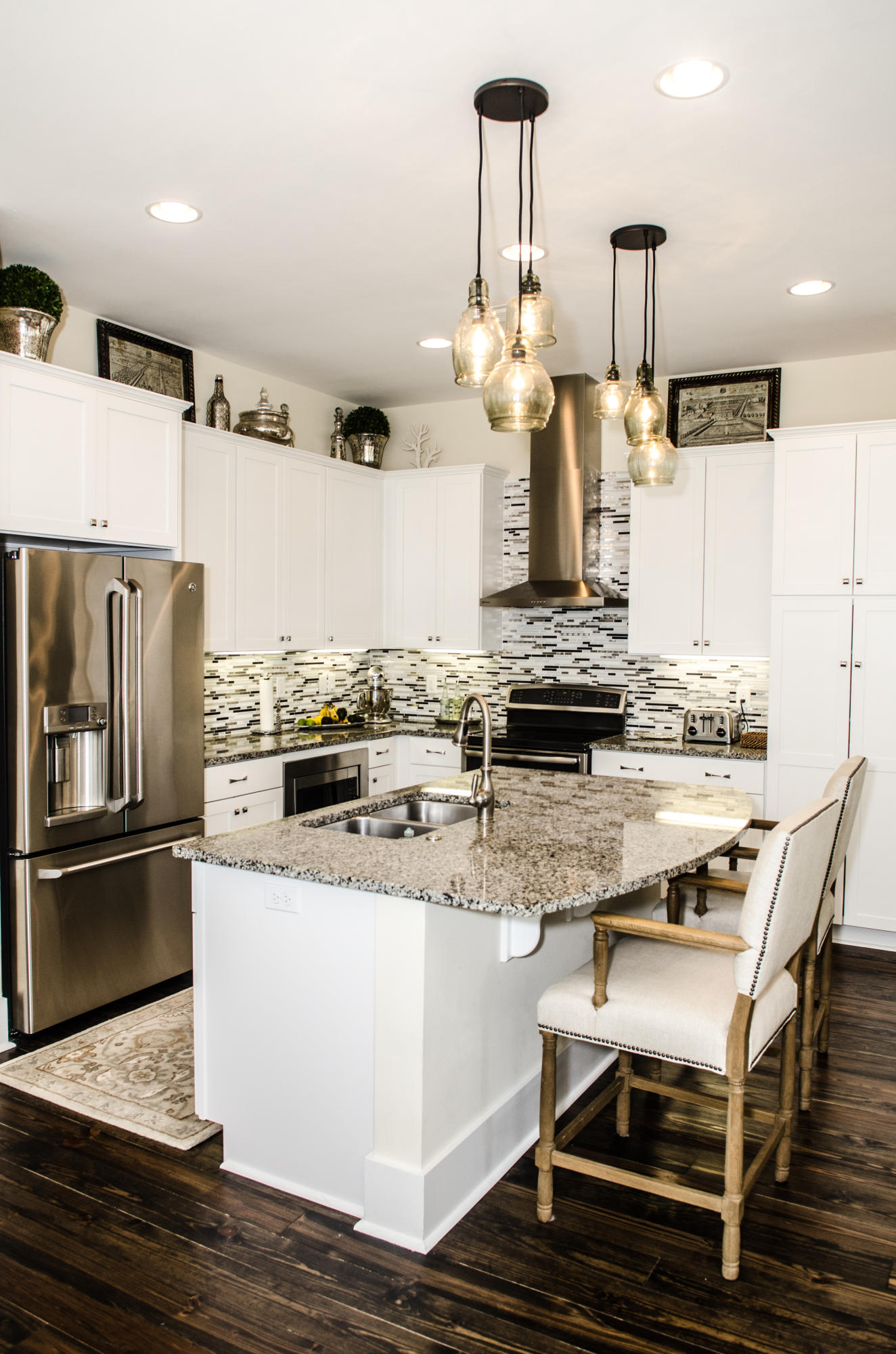 27 Rain Lily Lane Santa Rosa Beach, FL 32459 - Photo 5 of 21 a kitchen with a stove and a refrigerator