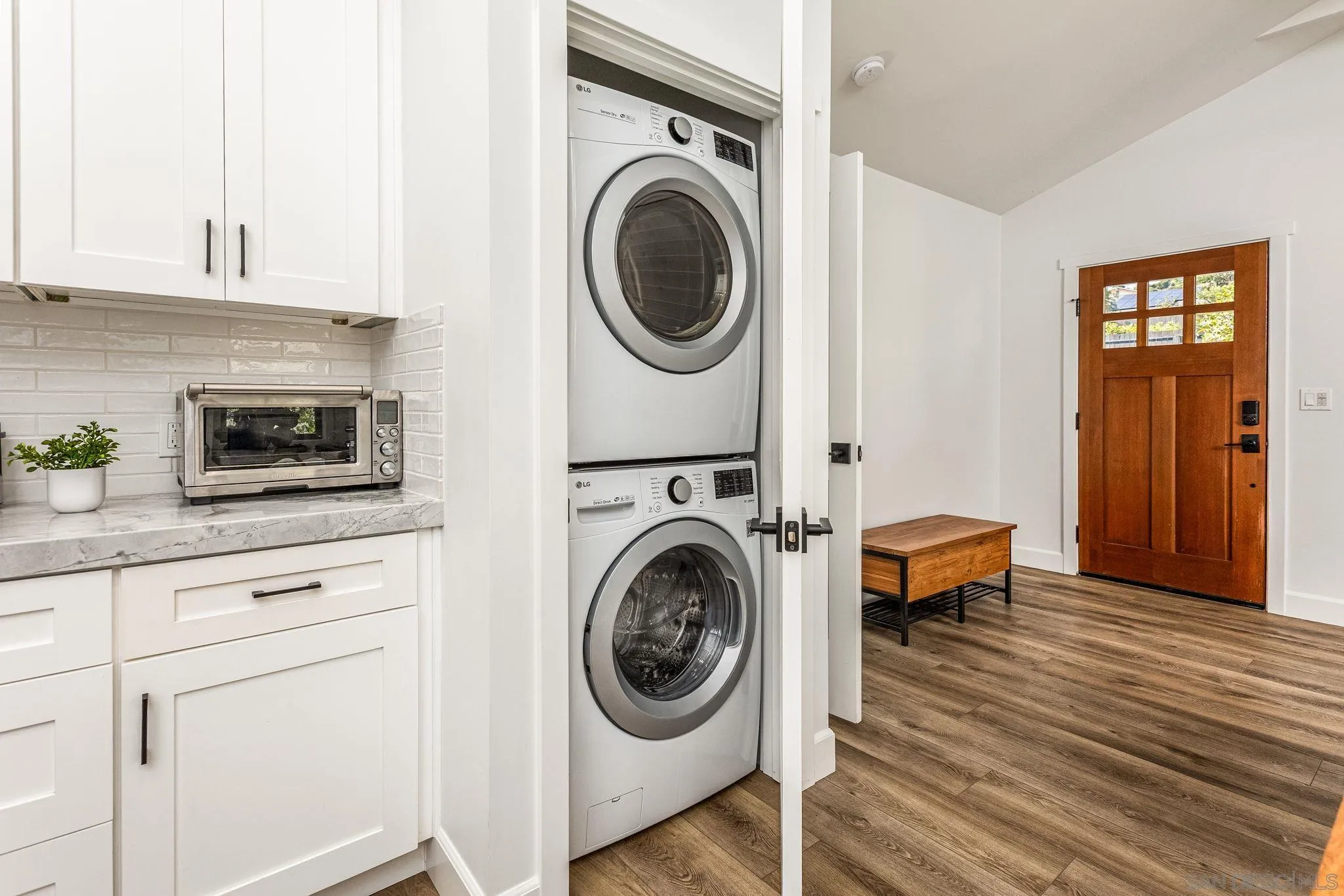 2335 Ivy Road Oceanside, CA 92054 - Photo 44 of 53 a utility room with sink dryer and washer