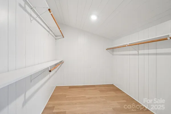 a view of a room with racks on the wall