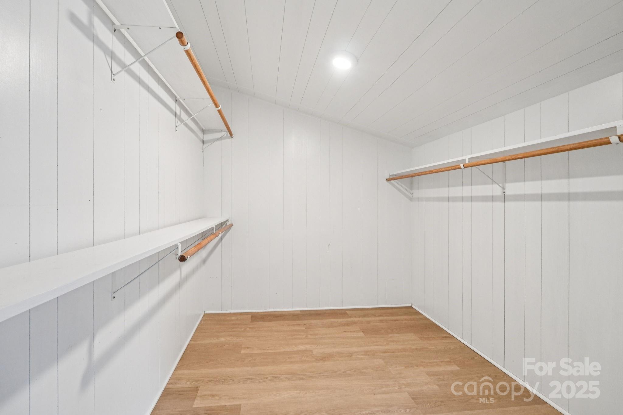 611 Sumner Street Kannapolis, NC 28083 - Photo 18 of 39 a view of a room with racks on the wall