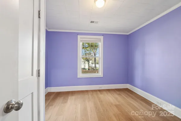 a view of a room with a window