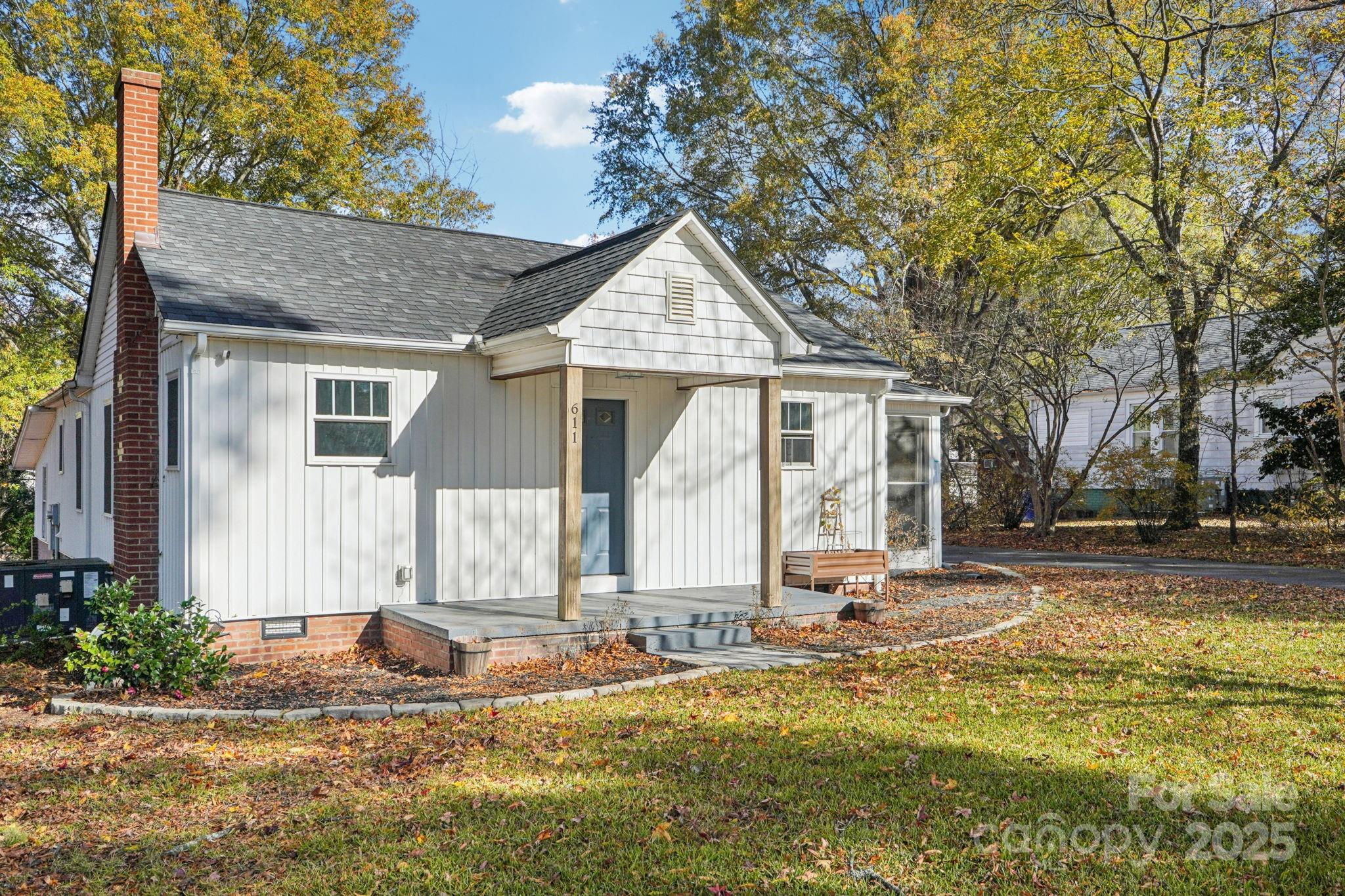 611 Sumner Street Kannapolis, NC 28083 - Photo 2 of 39 a front view of house with yard and trees around