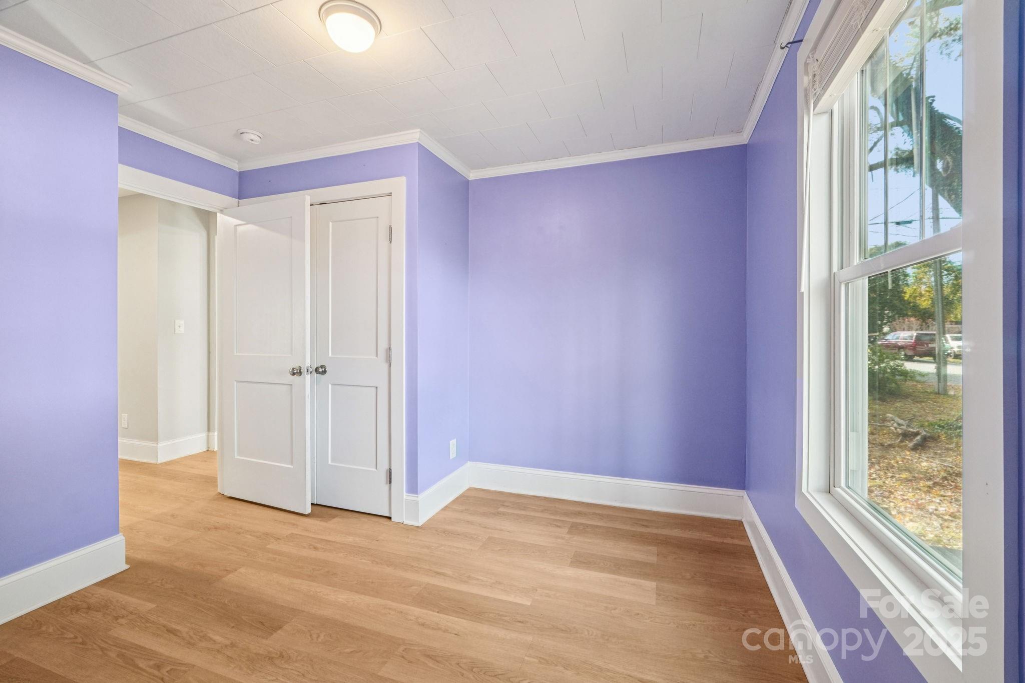 611 Sumner Street Kannapolis, NC 28083 - Photo 21 of 39 a view of an empty room with a window