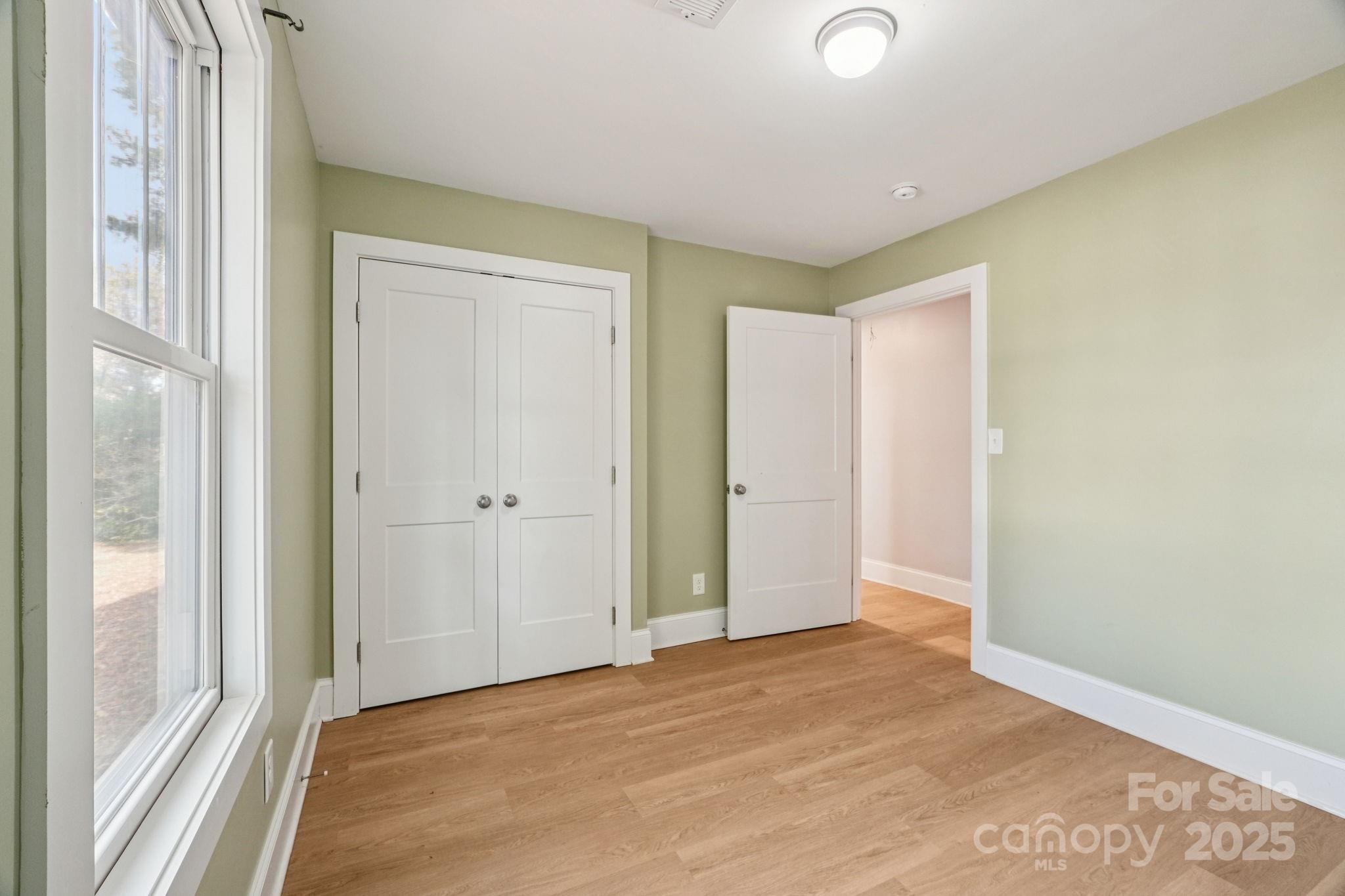 611 Sumner Street Kannapolis, NC 28083 - Photo 23 of 39 a view of an empty room and window