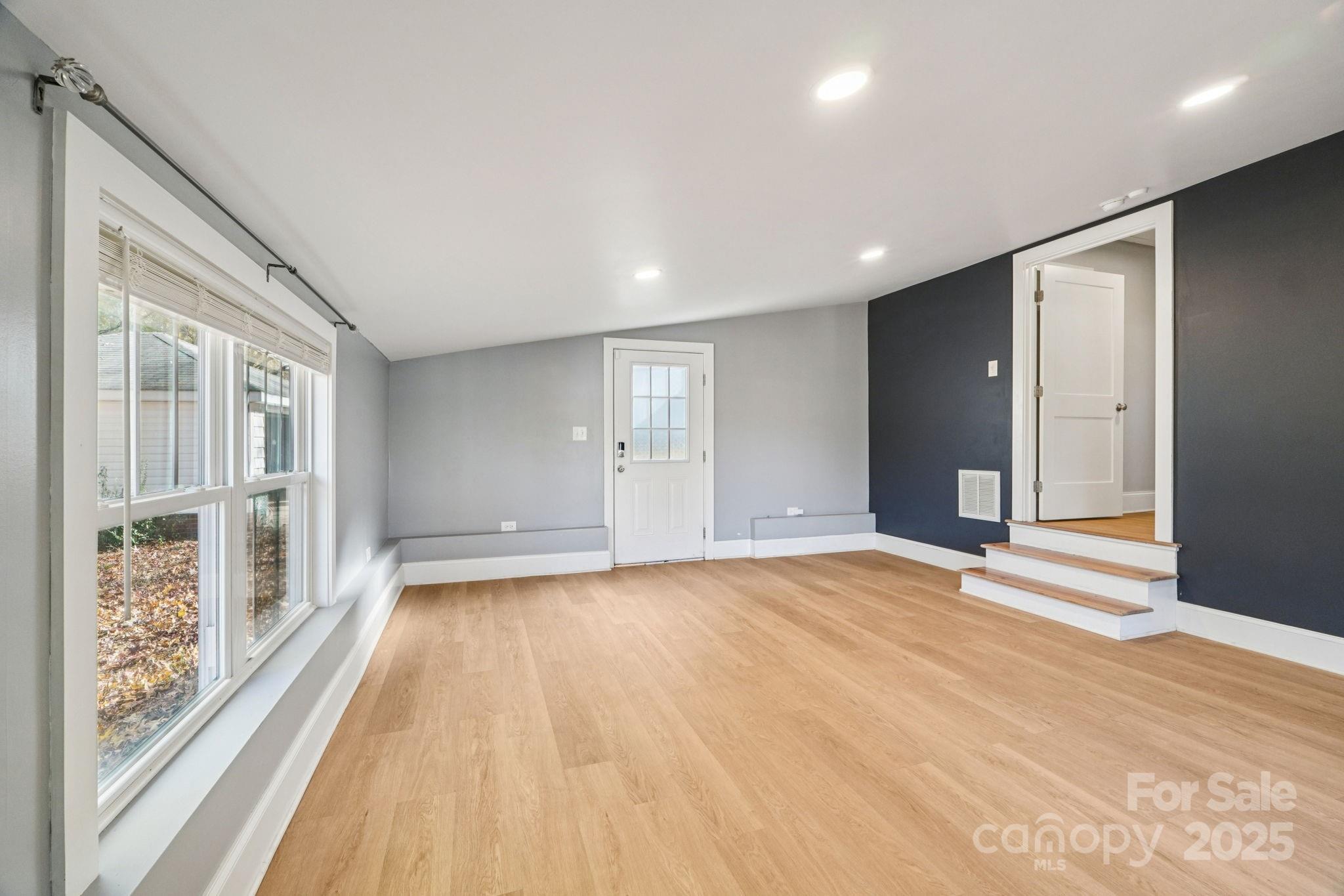 611 Sumner Street Kannapolis, NC 28083 - Photo 27 of 39 a view of an empty room with glass door