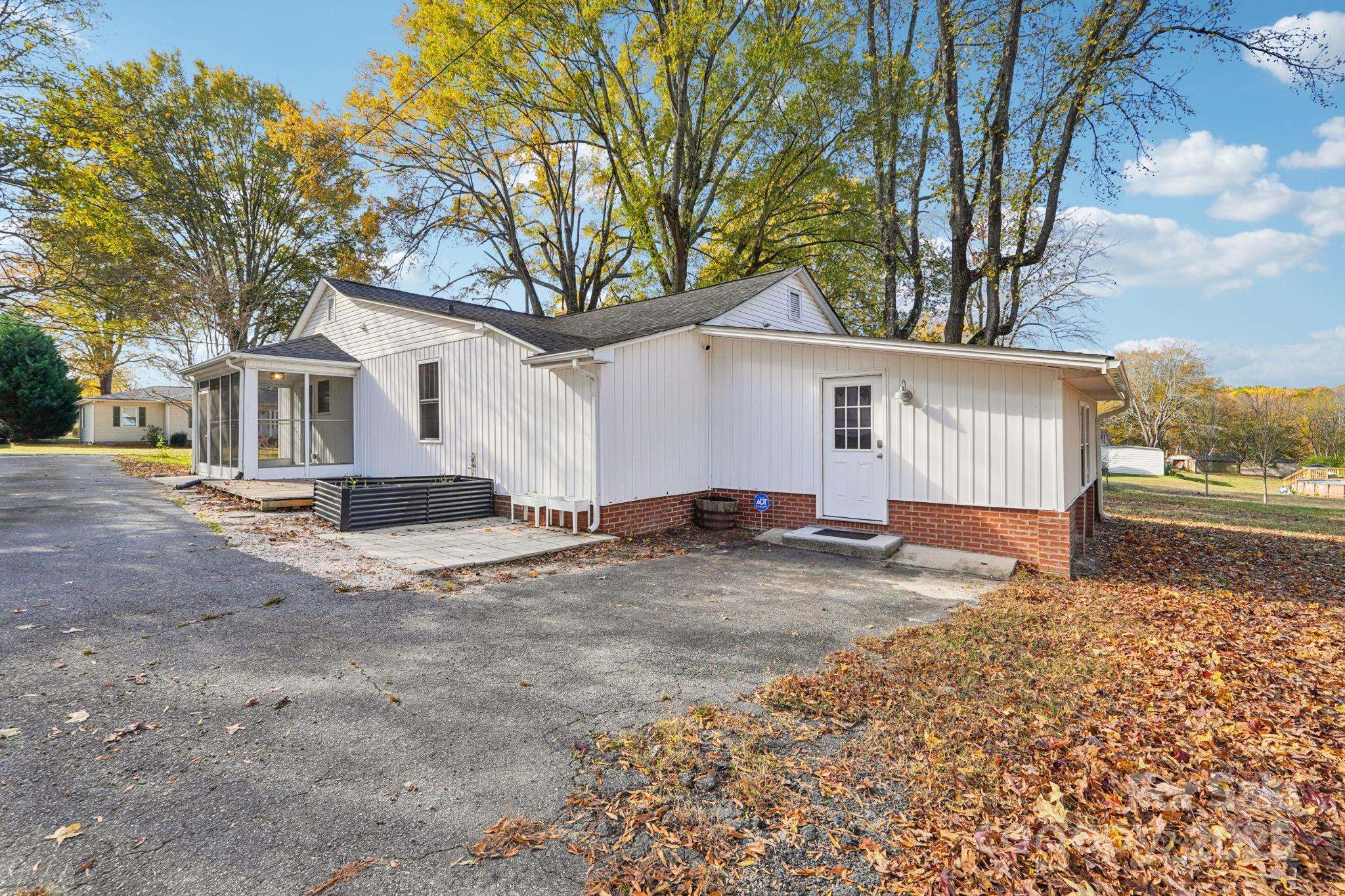 611 Sumner Street Kannapolis, NC 28083 - Photo 31 of 39 a view of a house with a snow in the yard