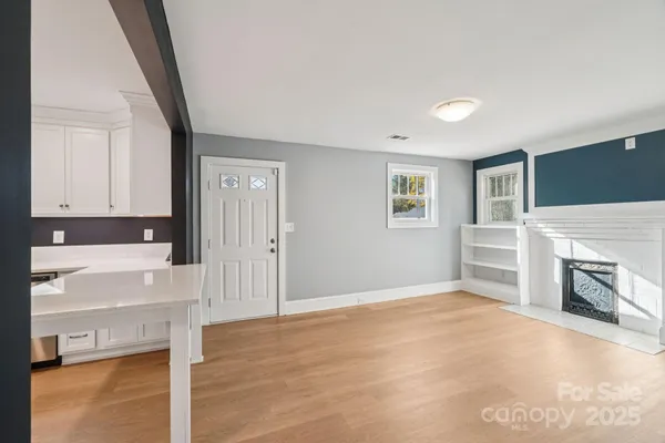 a view of a livingroom with a fireplace