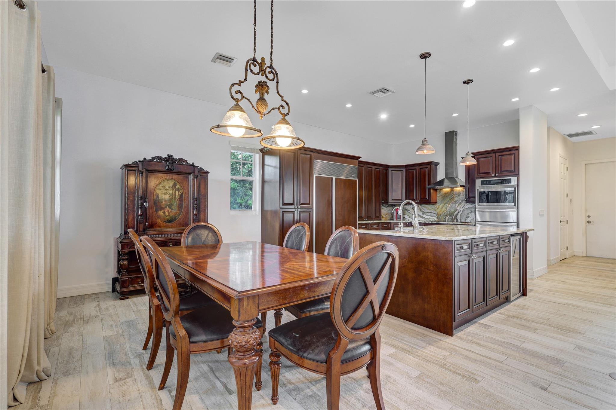 6601 Appaloosa Trail Southwest Ranches, FL 33330 - Photo 18 of 49 a dining room with furniture and window