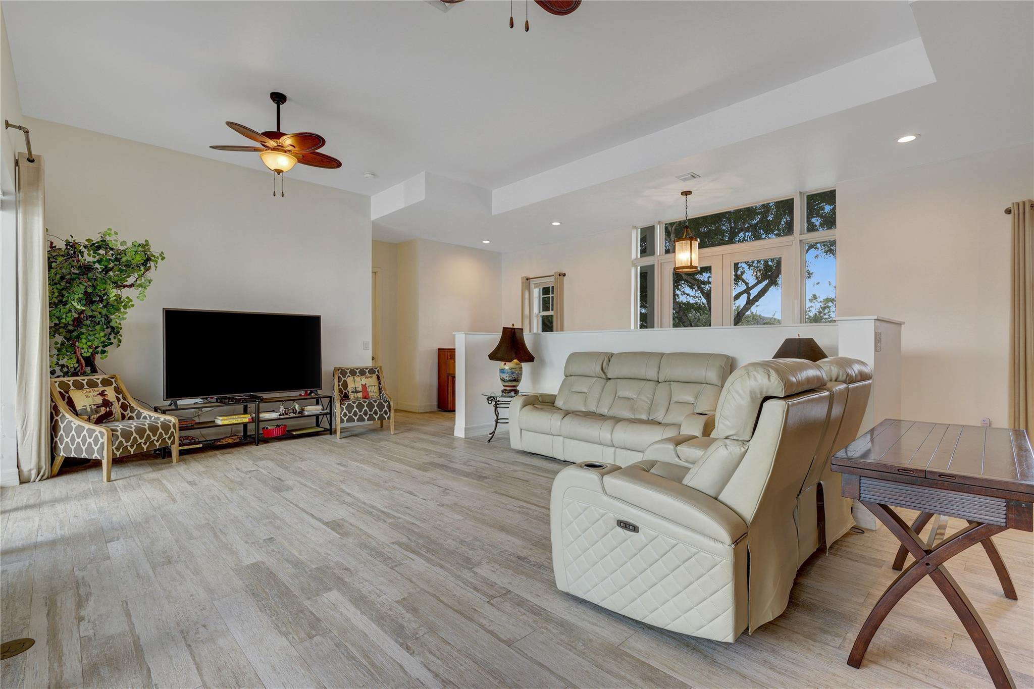 6601 Appaloosa Trail Southwest Ranches, FL 33330 - Photo 20 of 49 a living room with furniture and a flat screen tv