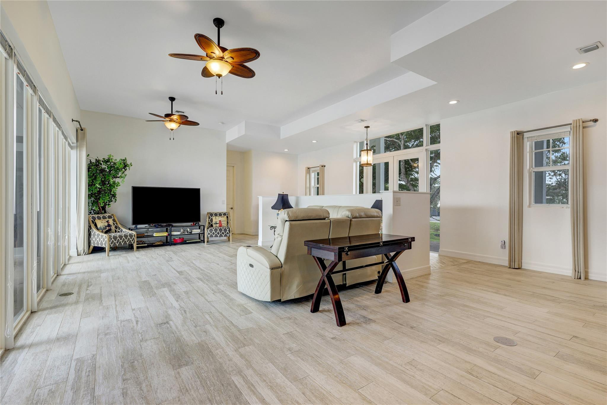 6601 Appaloosa Trail Southwest Ranches, FL 33330 - Photo 21 of 49 a living room with furniture and a flat screen tv