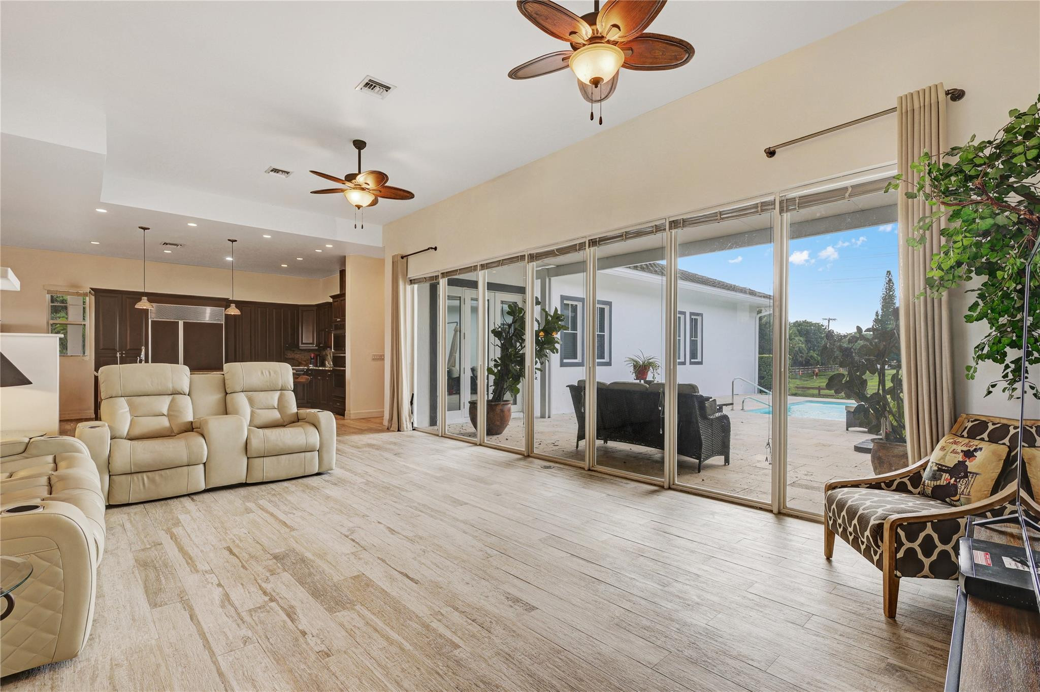 6601 Appaloosa Trail Southwest Ranches, FL 33330 - Photo 23 of 49 a living room with furniture and a large window
