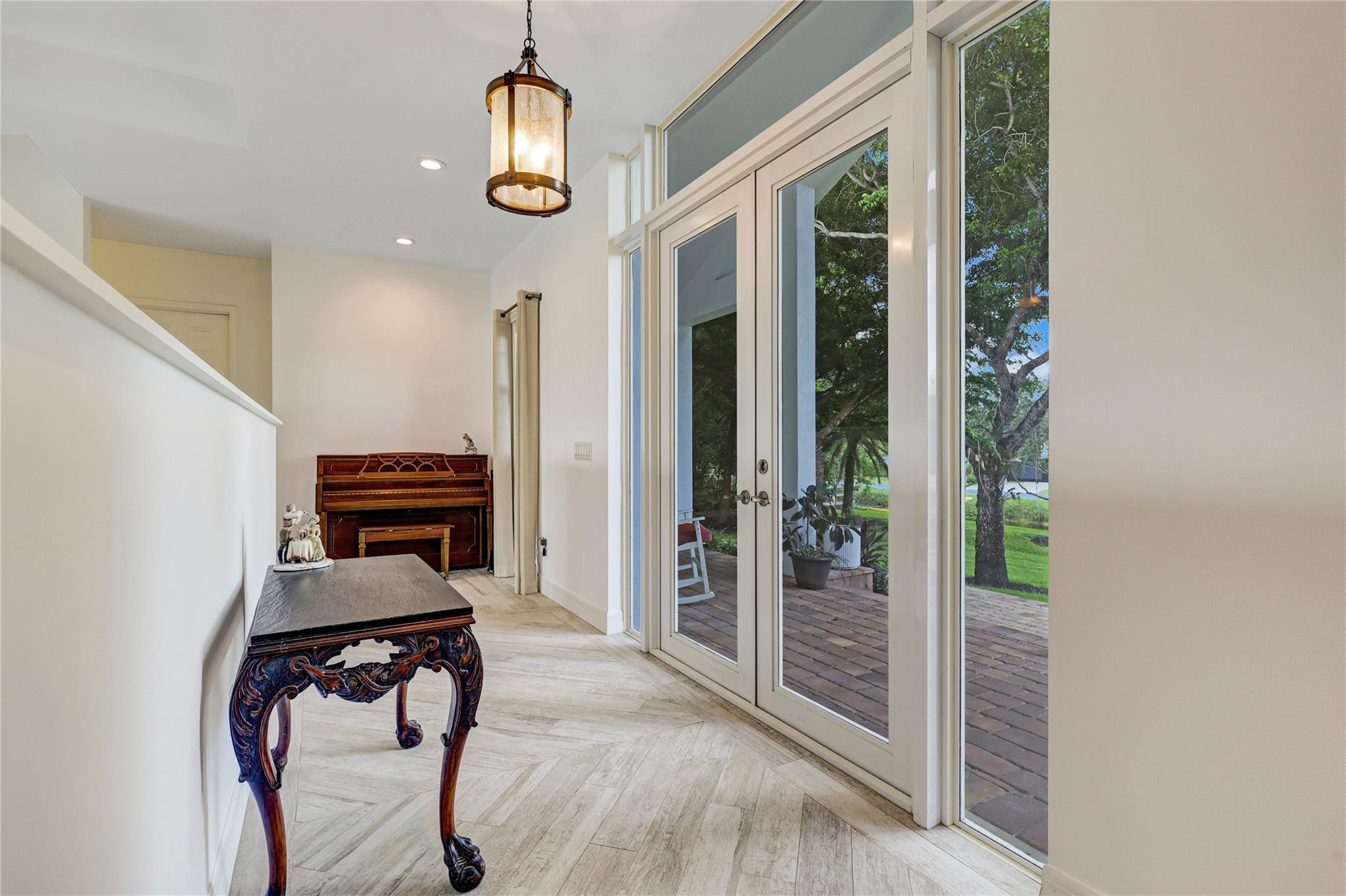 6601 Appaloosa Trail Southwest Ranches, FL 33330 - Photo 26 of 49 a view of an entryway with wooden floor