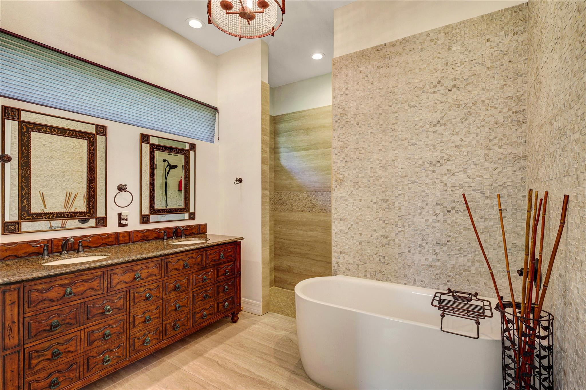 6601 Appaloosa Trail Southwest Ranches, FL 33330 - Photo 32 of 49 a bathroom with a tub sink and mirror