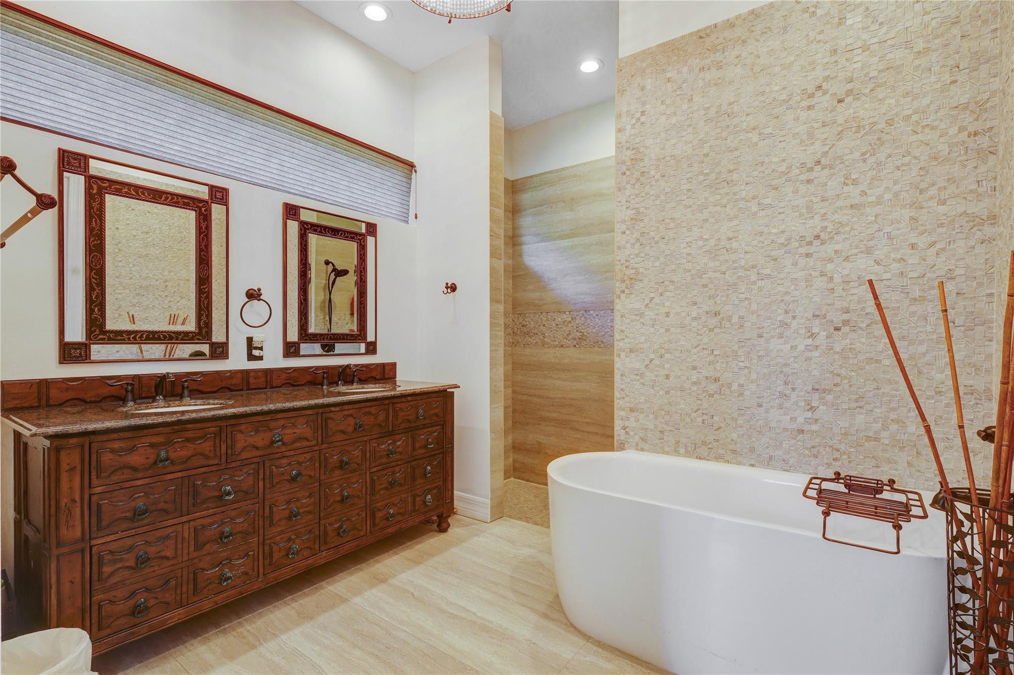 6601 Appaloosa Trail Southwest Ranches, FL 33330 - Photo 33 of 49 a bathroom with a double vanity sink a mirror and a bathtub