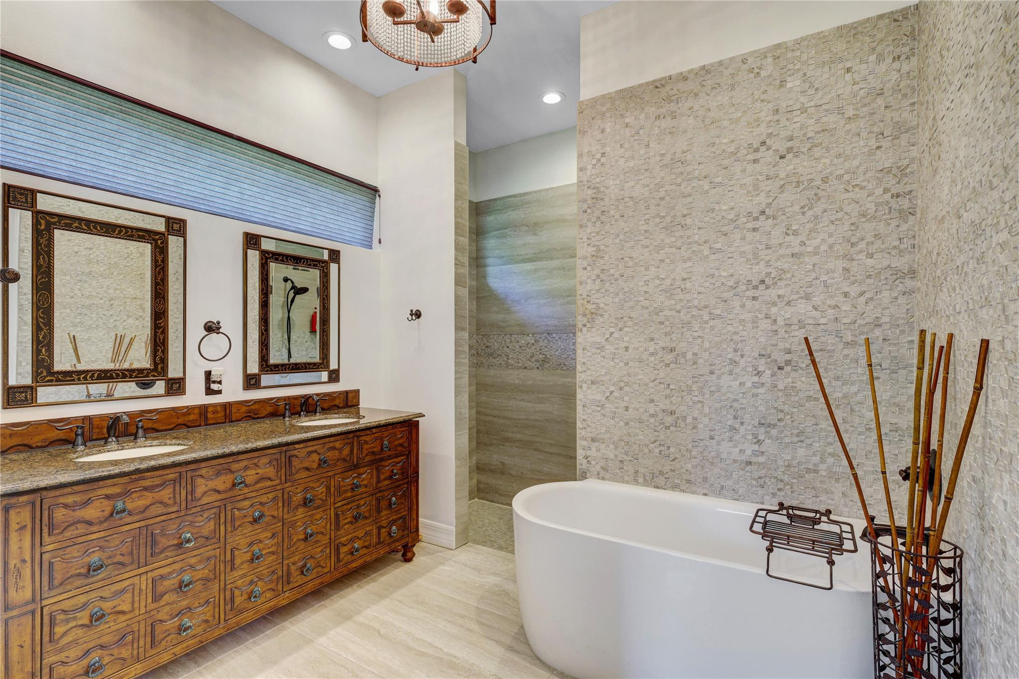 6601 Appaloosa Trail Southwest Ranches, FL 33330 - Photo 34 of 49 a bathroom with a tub sink and mirror