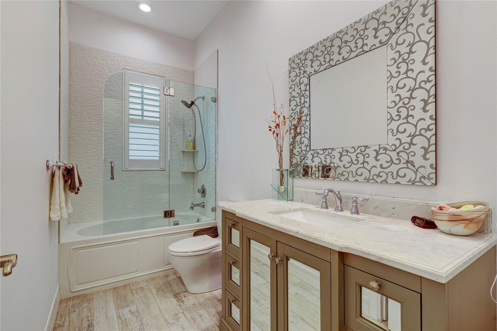 6601 Appaloosa Trail Southwest Ranches, FL 33330 - Photo 39 of 49 a bathroom with a sink a toilet and shower