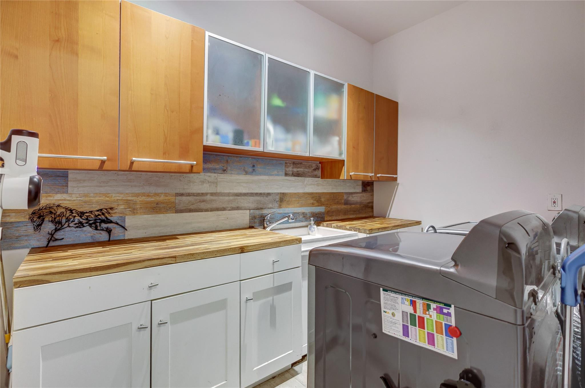 6601 Appaloosa Trail Southwest Ranches, FL 33330 - Photo 40 of 49 a kitchen with a sink cabinets and a window