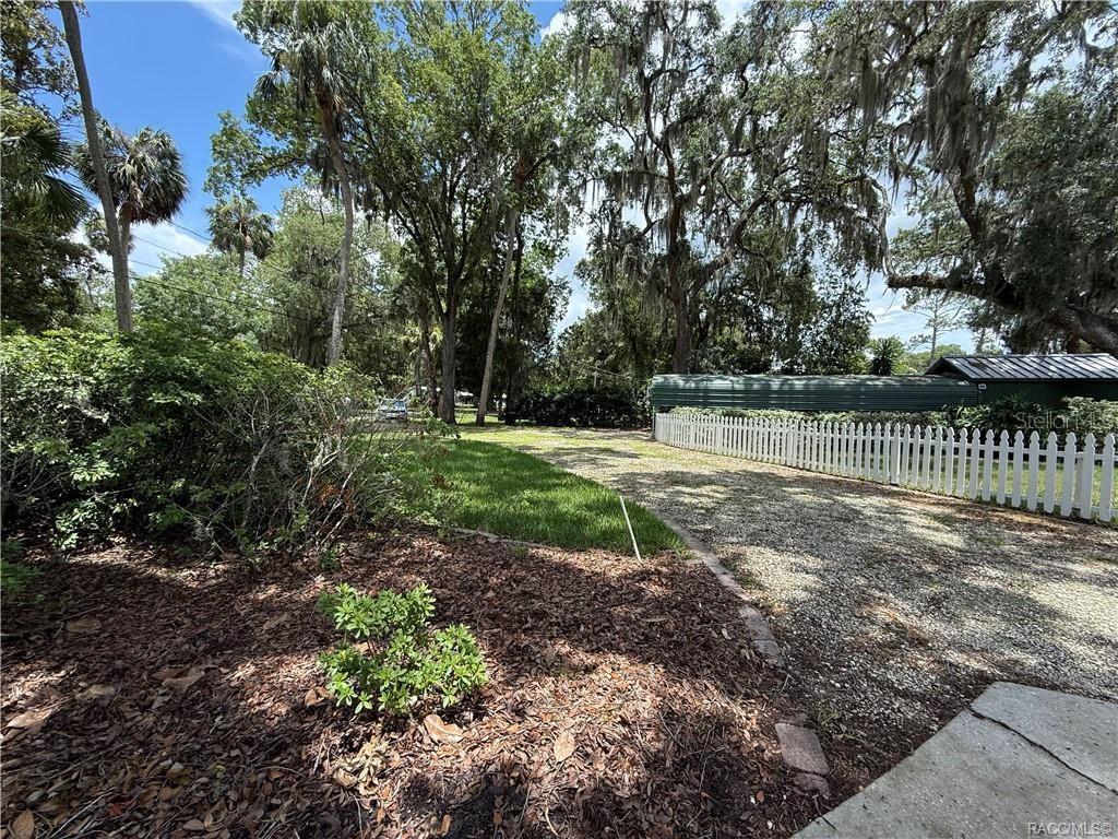 5217 Riverside Drive Yankeetown, FL 34498 - Photo 13 of 54 a view of a park with large trees