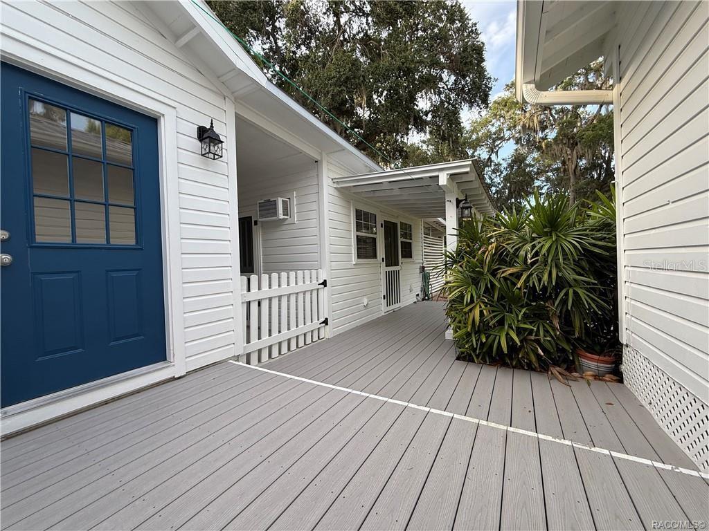 5217 Riverside Drive Yankeetown, FL 34498 - Photo 19 of 54 a view of backyard with a deck
