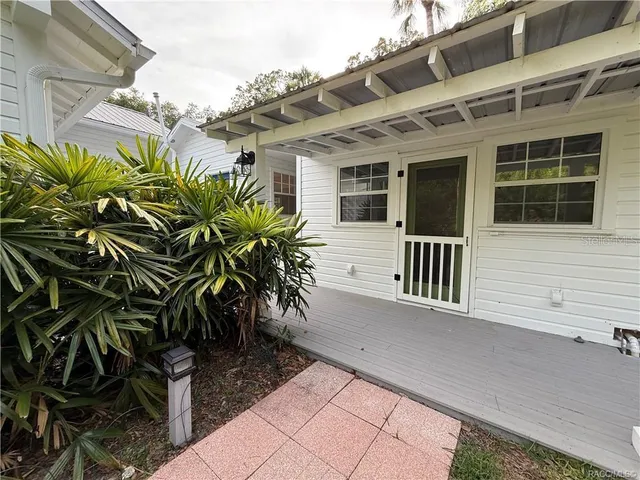 a view of a house with a porch