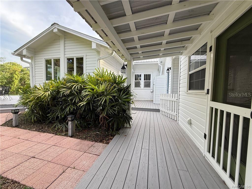 5217 Riverside Drive Yankeetown, FL 34498 - Photo 21 of 54 a view of a house with a porch