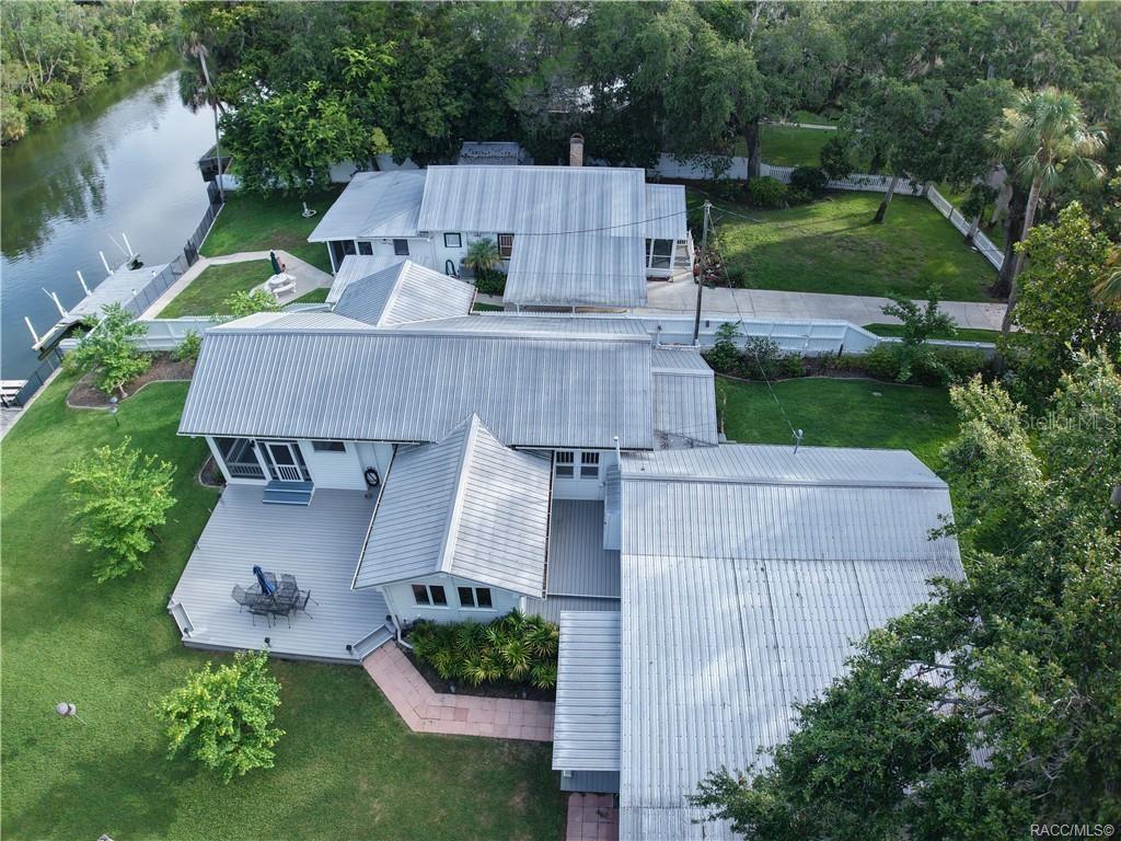 5217 Riverside Drive Yankeetown, FL 34498 - Photo 48 of 54 an aerial view of a house with garden space and street view