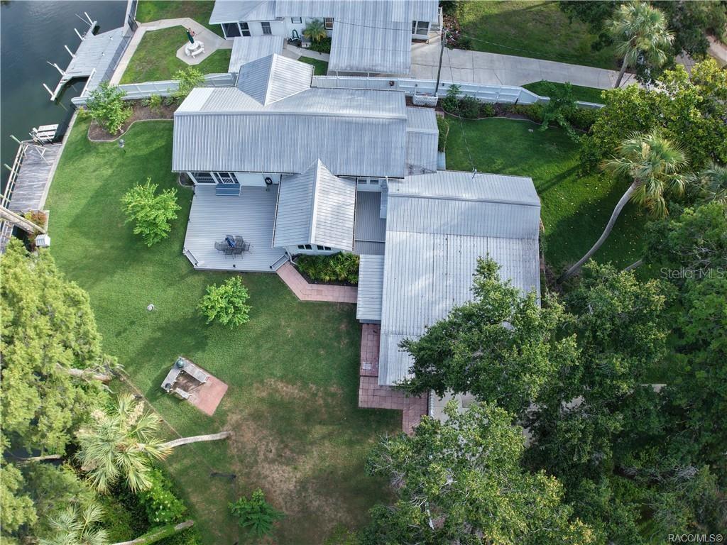 5217 Riverside Drive Yankeetown, FL 34498 - Photo 50 of 54 an aerial view of a house with swimming pool and garden