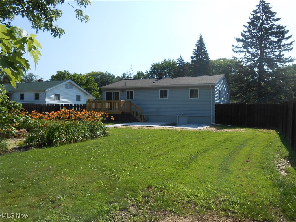 17022 Howe Road Strongsville, OH 44136 - Photo 17 of 22 Back of property with a deck and a patio area