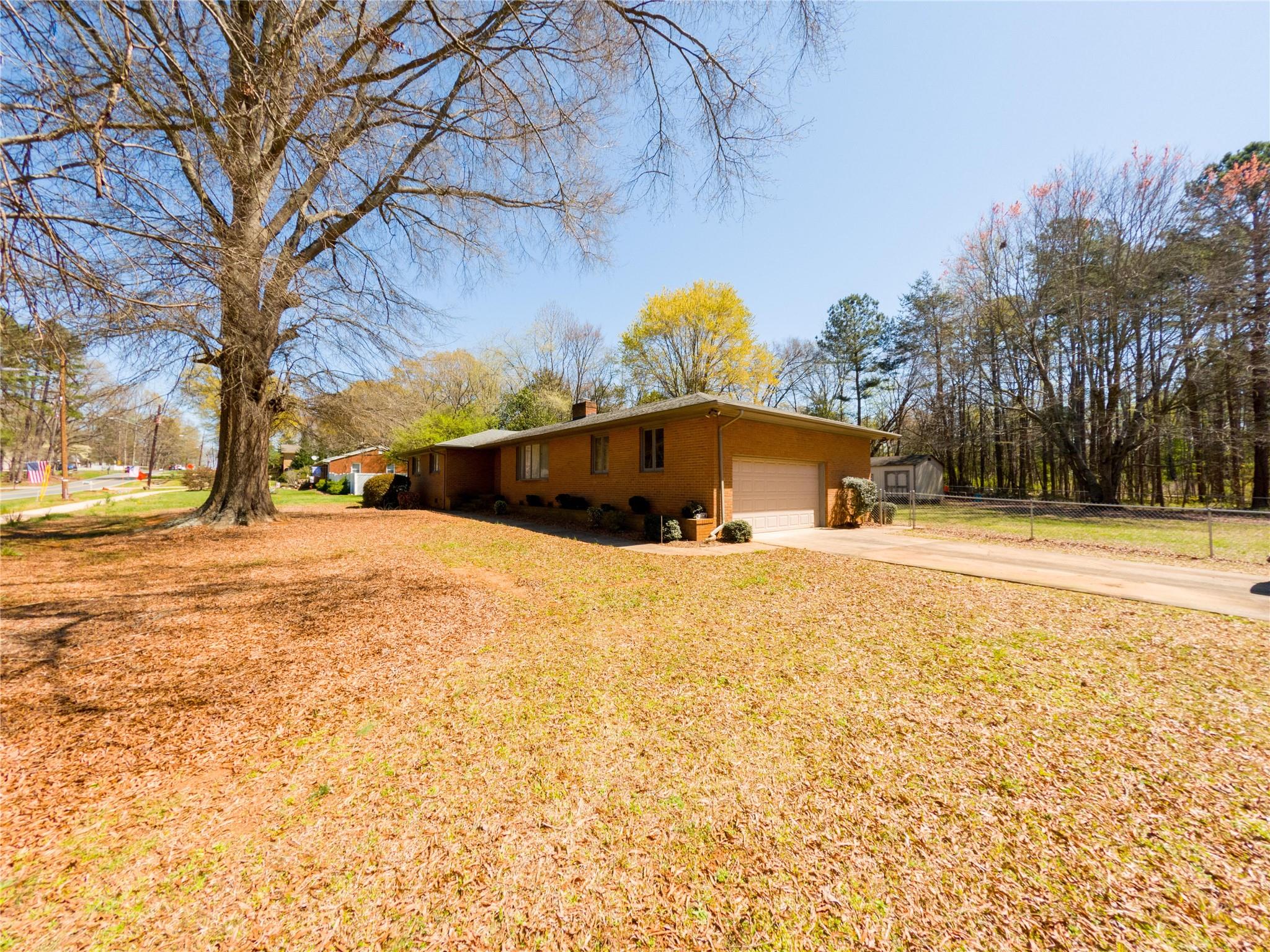 4910 Lakeview Road Charlotte, NC 28216 - Photo 3 of 26 a view of swimming pool with an outdoor space