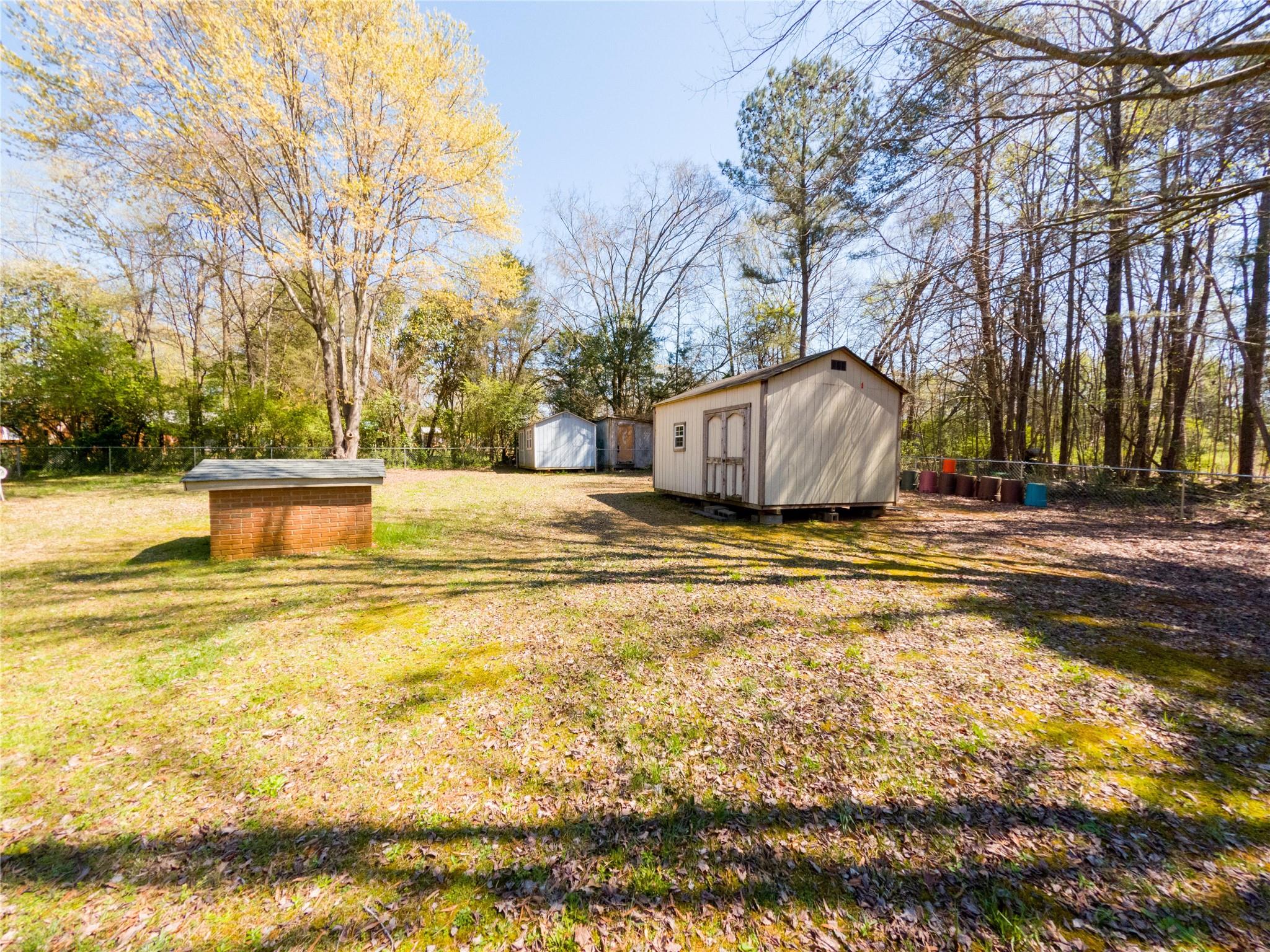 4910 Lakeview Road Charlotte, NC 28216 - Photo 6 of 26 a view of a swimming pool with an outdoor space and seating area