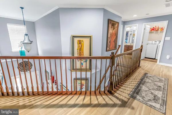 a view of staircase with rug floor