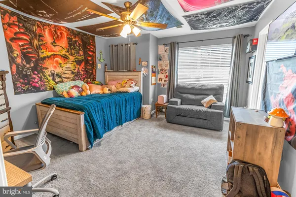 a room with furniture and a window