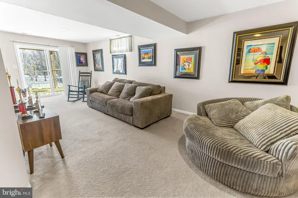 a view of a balcony with furniture