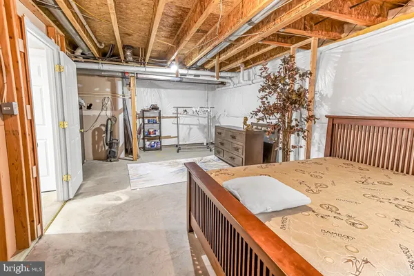 a bathroom with a toilet a sink and a mirror