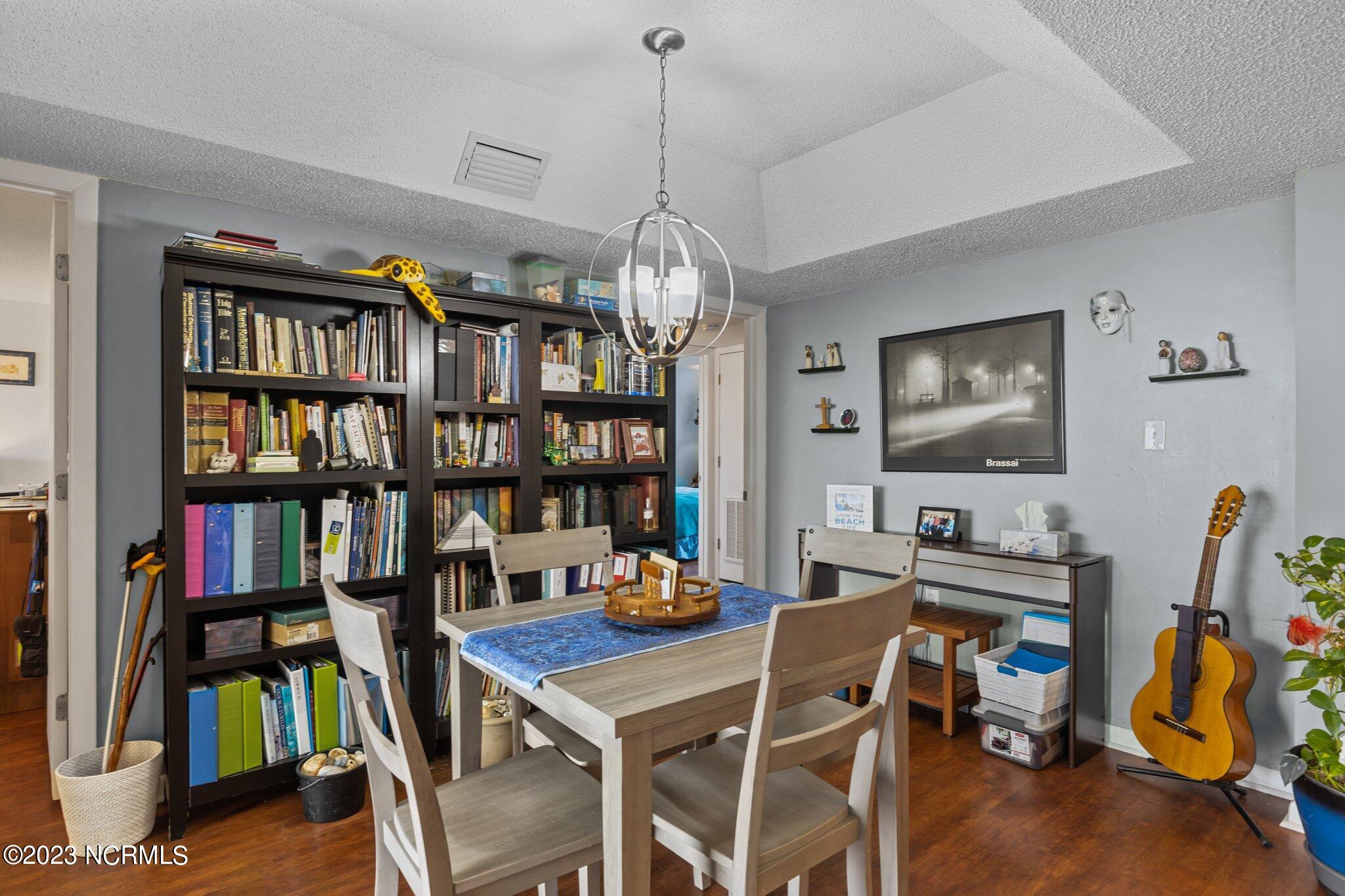 1505 Salter Path Road, Unit 238 Indian Beach, NC 28512 - Photo 16 of 49 Dining room with access to master bedroom and hall bath and other 2 bedrooms