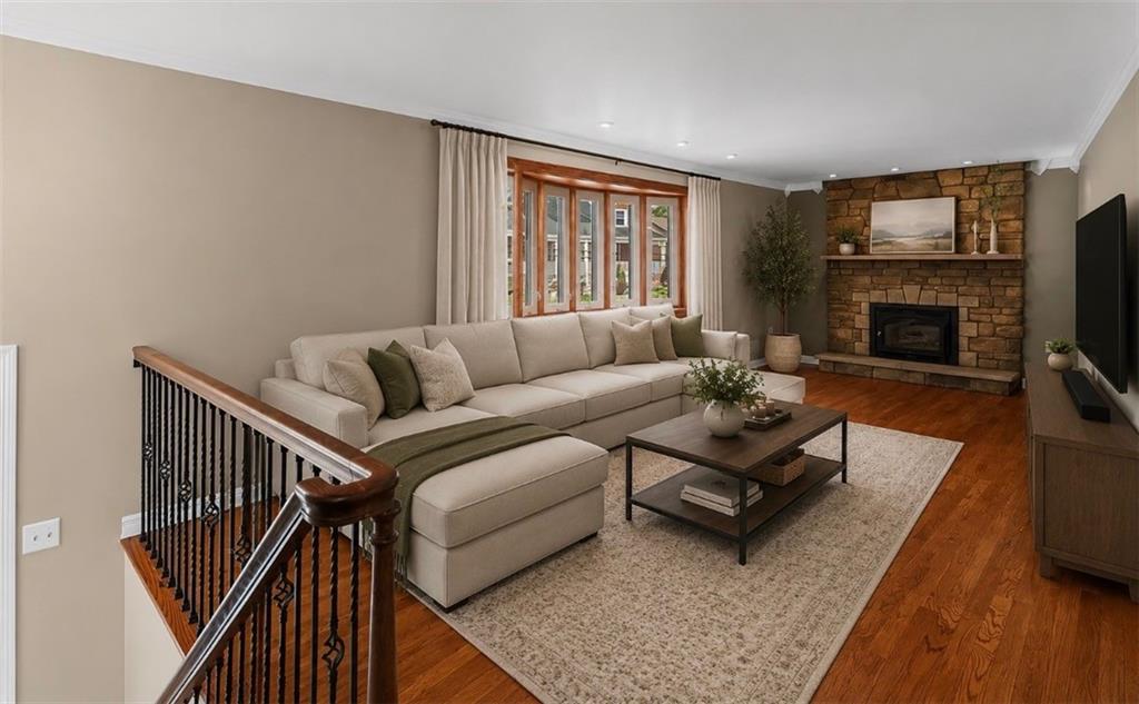 1351 Carnahan Road Pittsburgh, PA 15220 - Photo 8 of 50 a living room with furniture and a fireplace