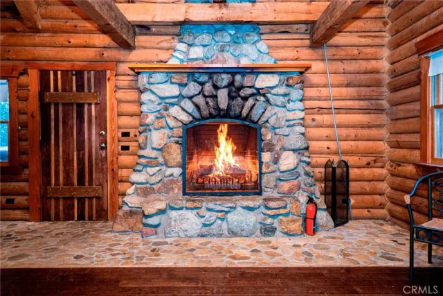 a view of a fireplace with wooden floor