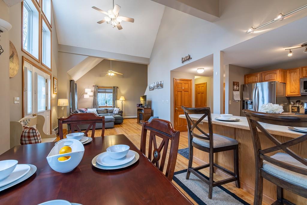 64 Leno Road Holland, MA 01521 - Photo 16 of 36 a dining room with furniture and a wooden floor