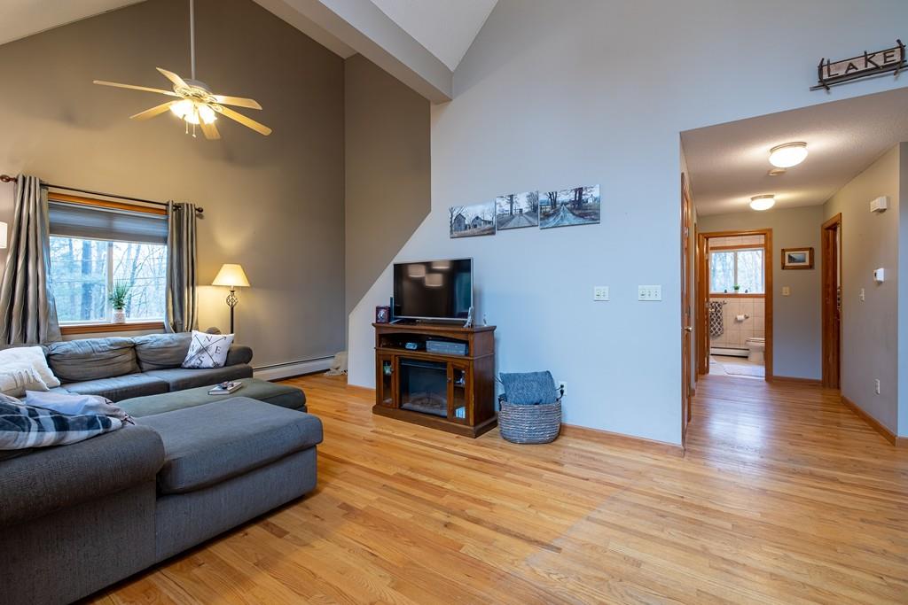 64 Leno Road Holland, MA 01521 - Photo 18 of 36 a living room with furniture and wooden floor