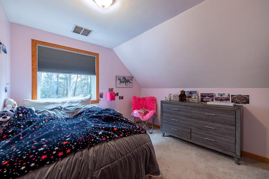 64 Leno Road Holland, MA 01521 - Photo 24 of 36 a bedroom with a bed and a window