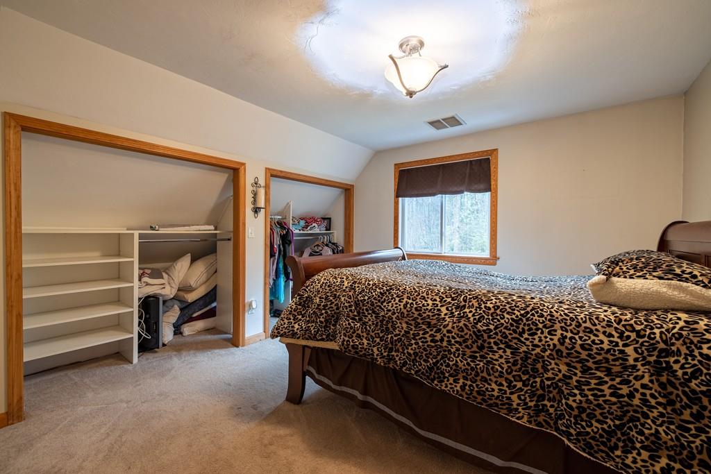 64 Leno Road Holland, MA 01521 - Photo 28 of 36 a bedroom with a bed and a window
