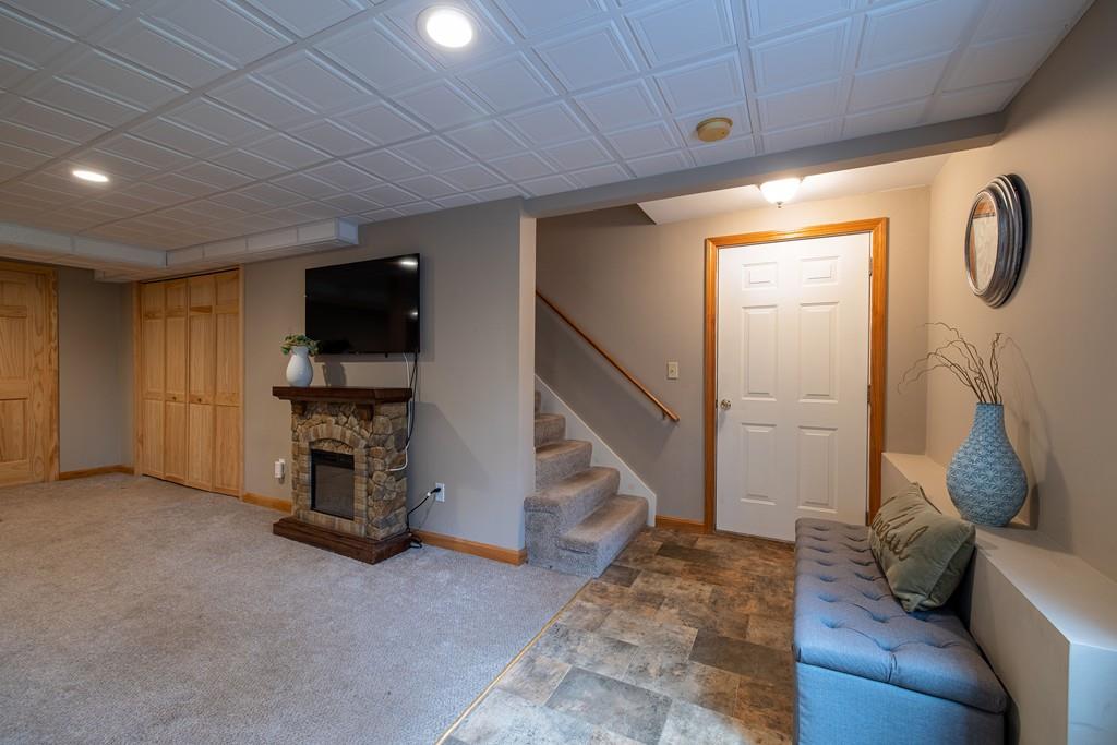 64 Leno Road Holland, MA 01521 - Photo 32 of 36 a living room with furniture and a flat screen tv