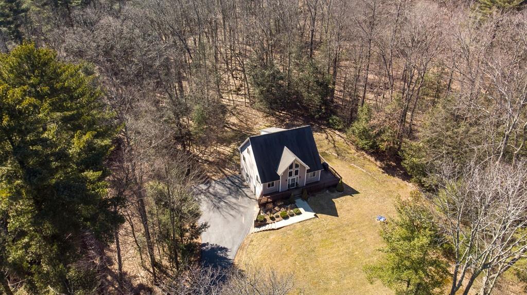 64 Leno Road Holland, MA 01521 - Photo 35 of 36 a view of a house with a yard