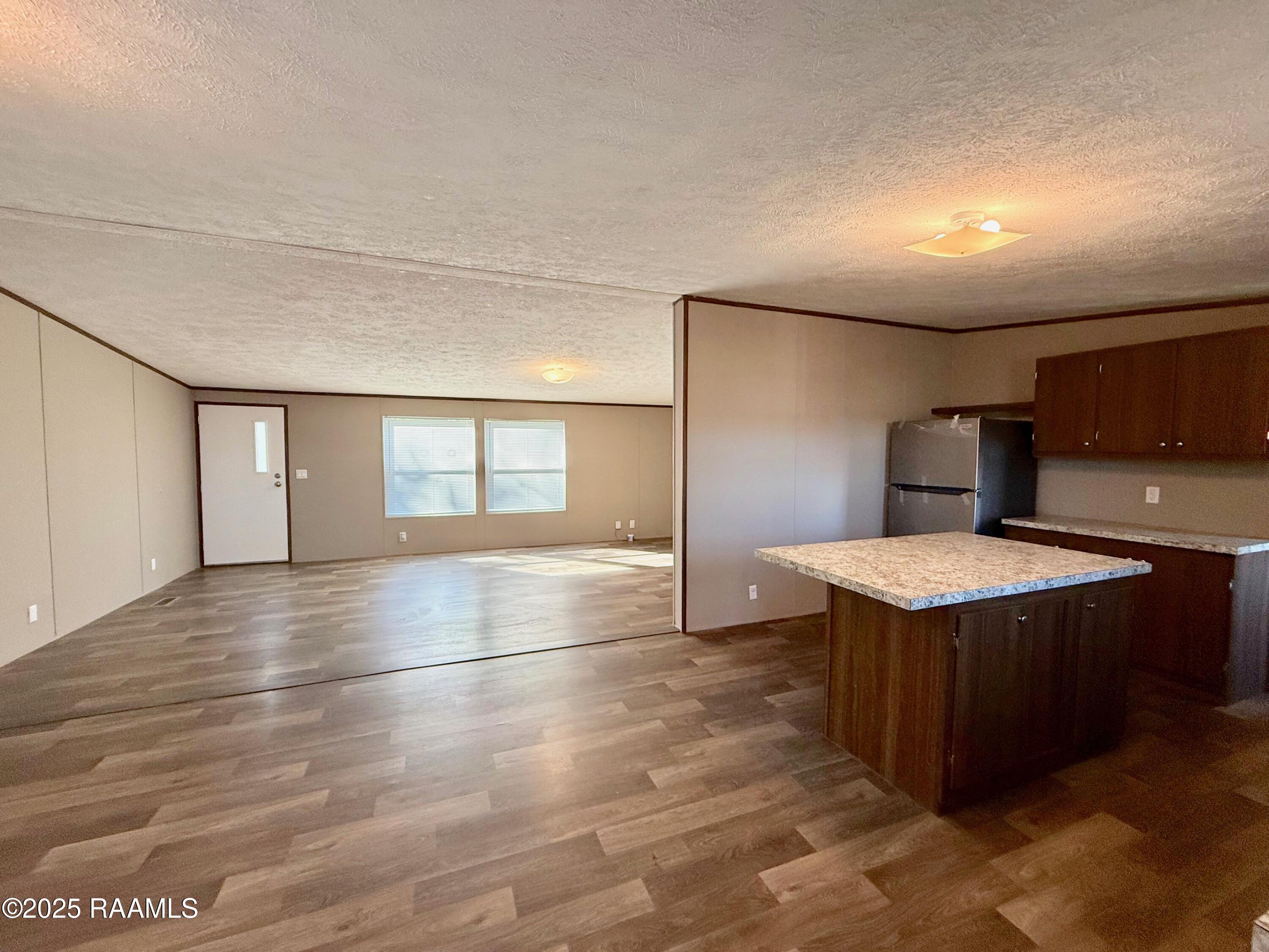 125 La Rue Cannes Duson, LA 70529 - Photo 12 of 40 living room/kitchen